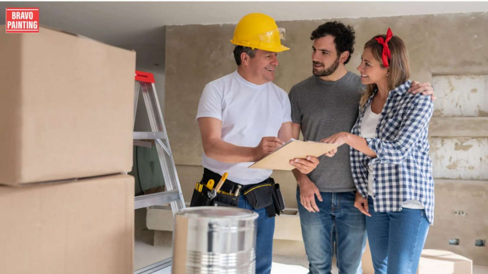 home painting contractor discussing the paint work