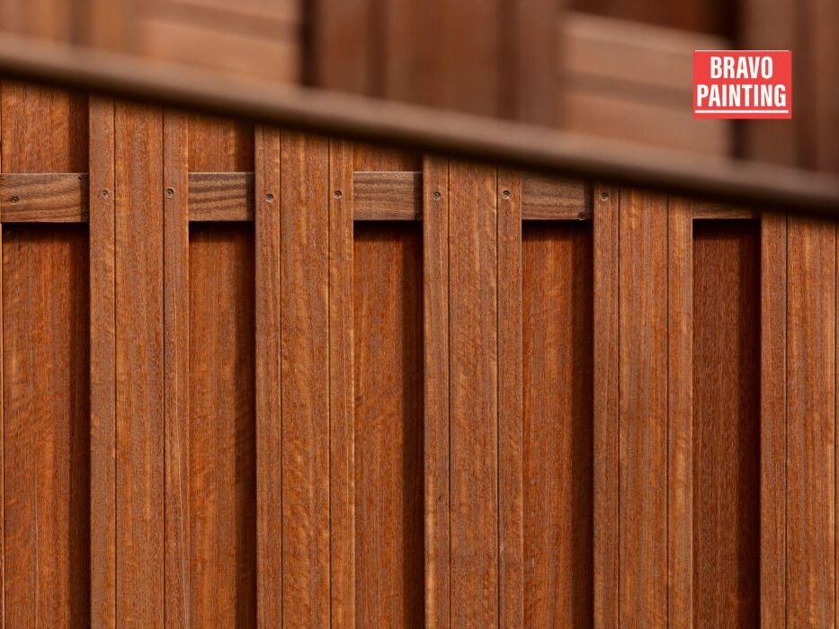 Wooden fence with painted panels