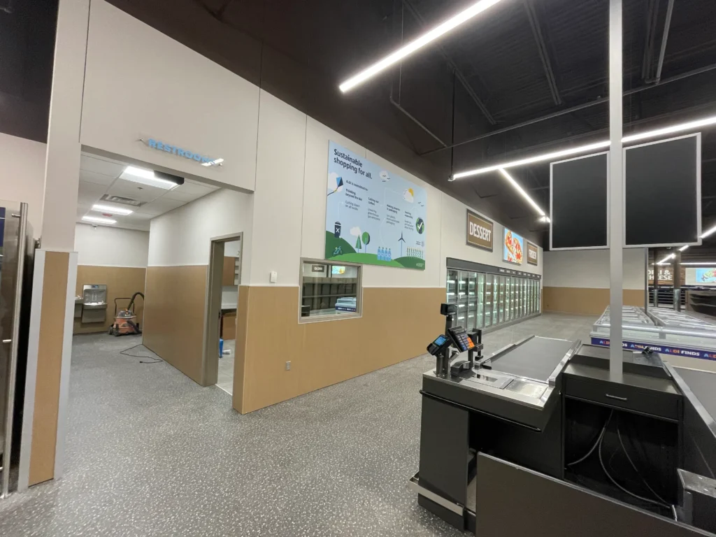 a large building with a few cash register machines