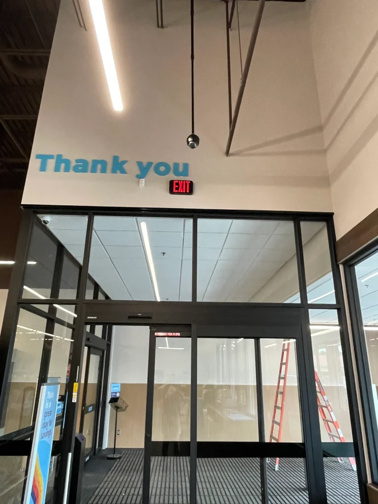 a sign on the wall of a building