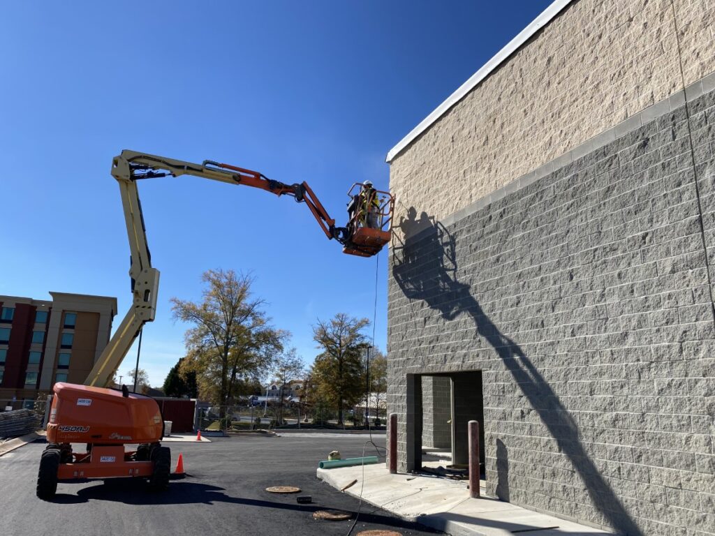 a crane lifting a building
