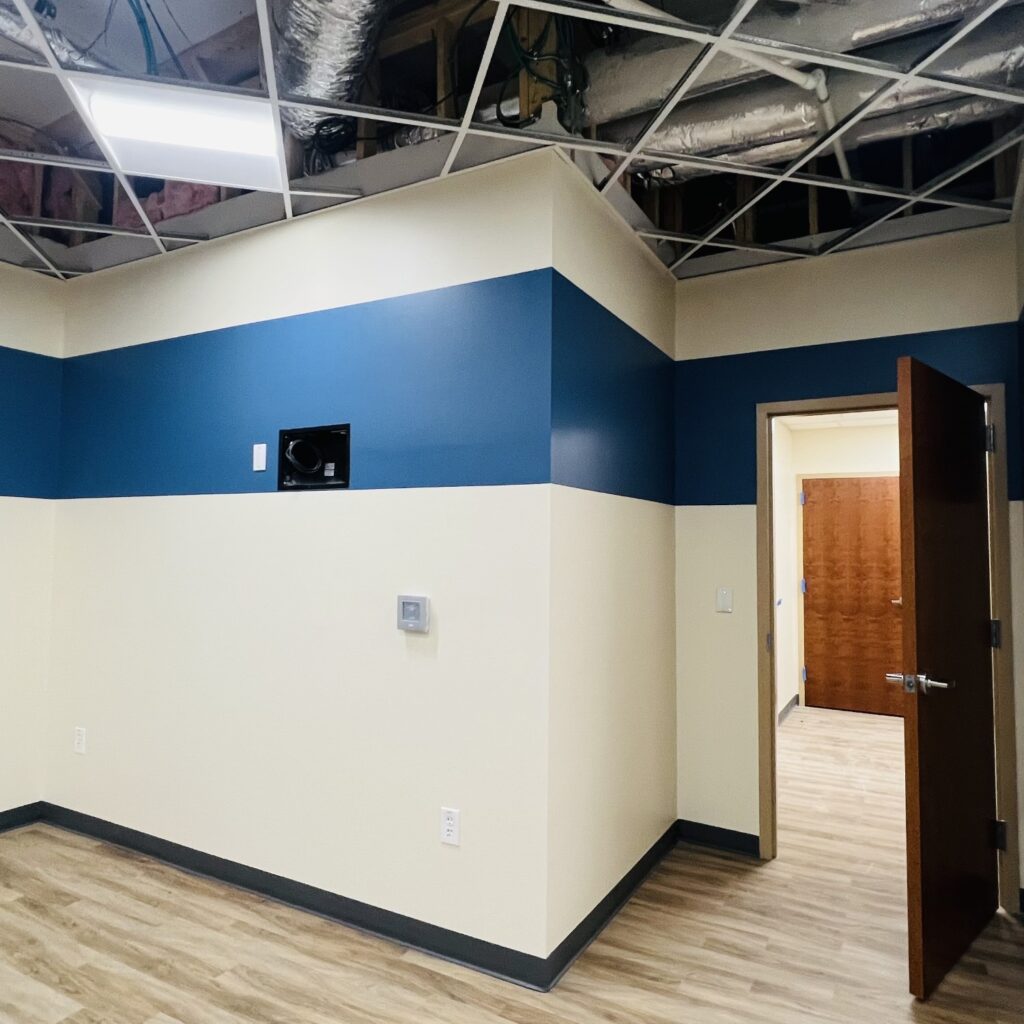 a room with blue and white stripes