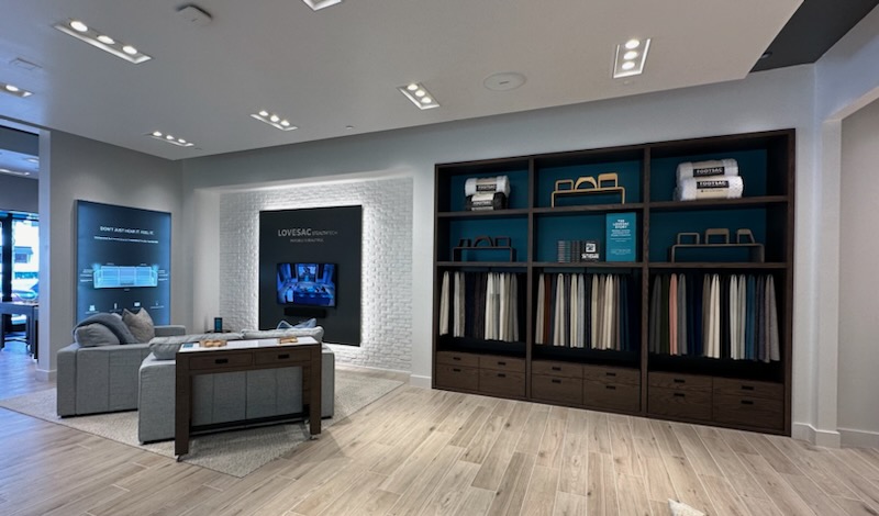 a room with shelves and a tv