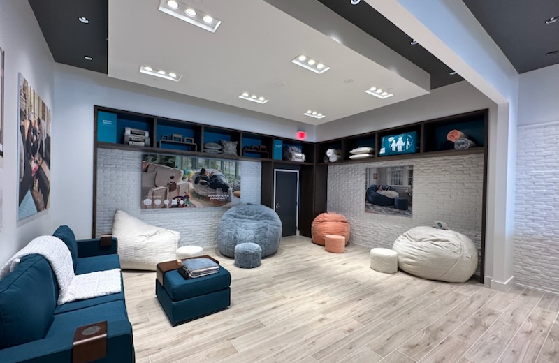 a room with large bean bags and a couch