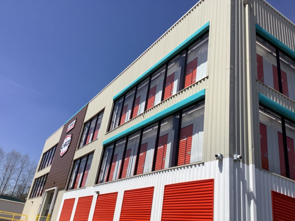 a building with red shutters