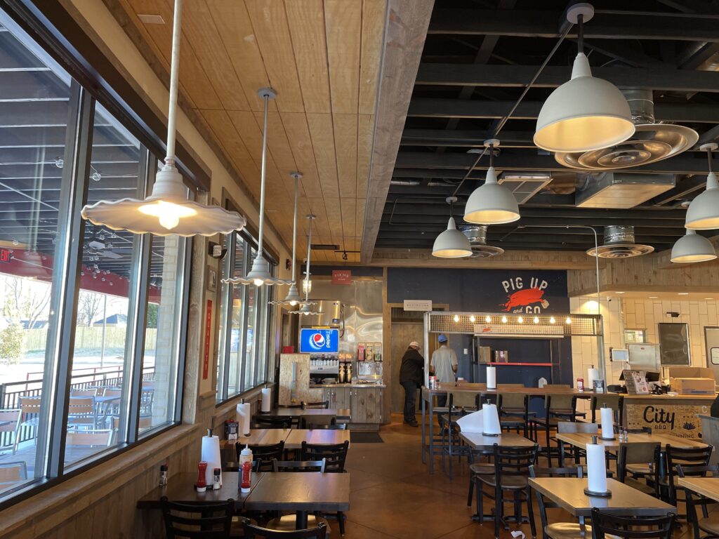 a restaurant with tables and chairs